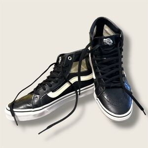 Vans Men's Black and White High-Top Sneakers